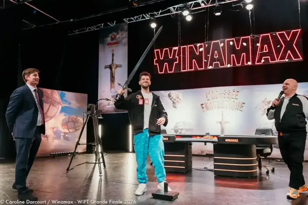 Sacha Cohen posing with the WiPT Sword